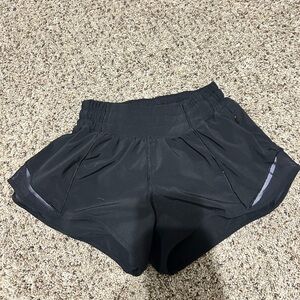 Black lululemon low rise hotty hot shorts - size 2 - length 2.5